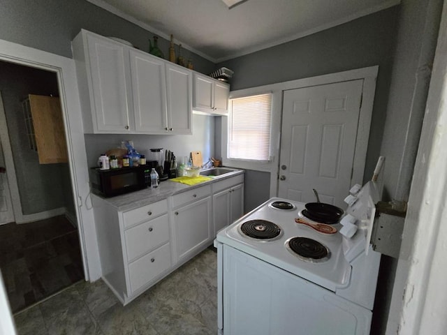 kitchen with black microwave, white cabinetry, and electric range