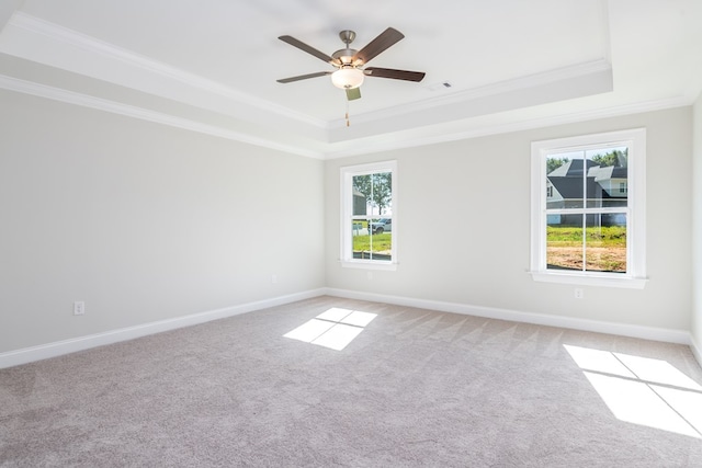 103 Cleo Ct, Enterprise, AL 36330 - unfurnished room featuring a tray ceiling, ornamental molding, light colored carpet, and a ceiling fan