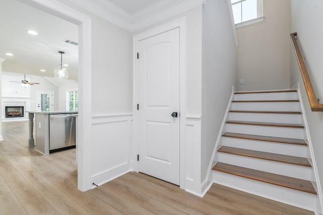 103 Cleo Ct, Enterprise, AL 36330 - stairway featuring healthy amount of natural light, ceiling fan, crown molding, recessed lighting, and wood finished floors