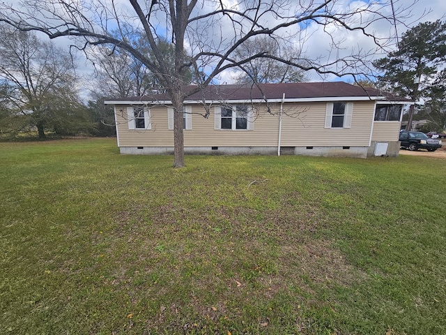 307 Rockhill Cir, Abbeville, AL 36310 - rear view of property featuring a lawn and crawl space