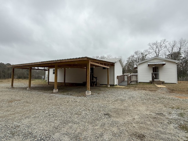 view of outdoor structure with a carport