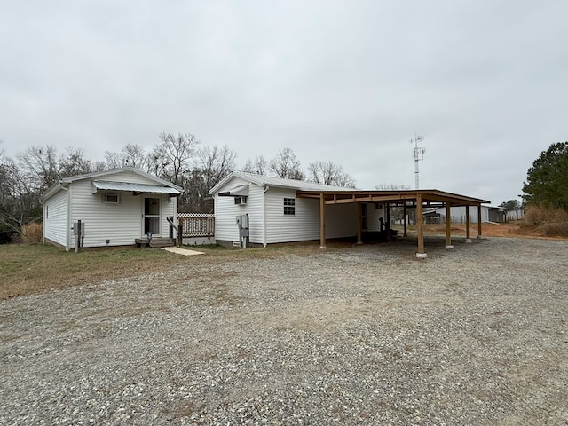 view of front of house featuring a carport