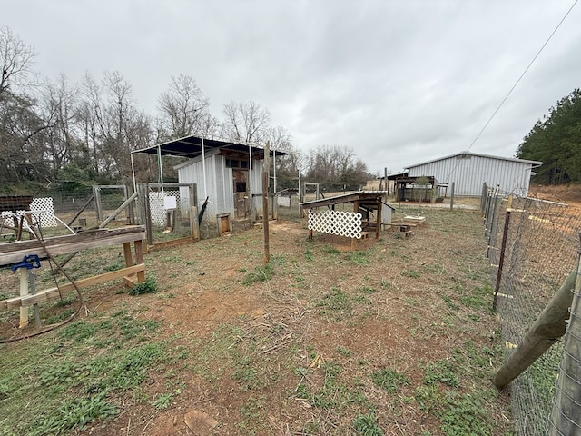 view of yard with an outdoor structure