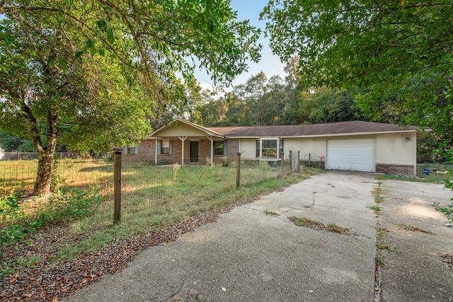 single story home featuring a garage