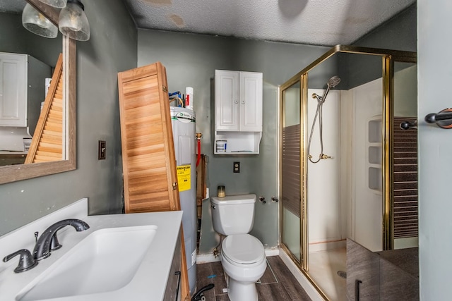 bathroom featuring hardwood / wood-style floors, vanity, walk in shower, and a textured ceiling