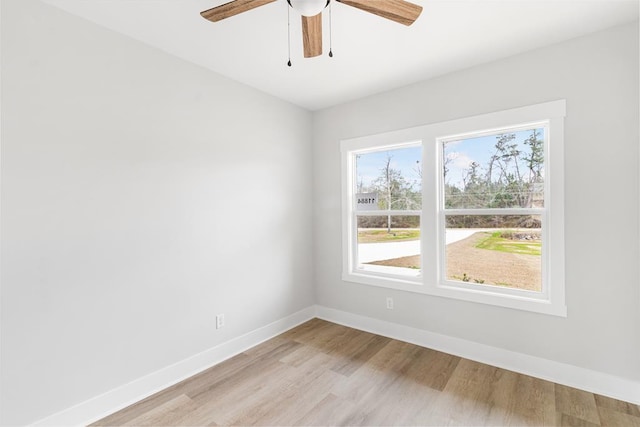 unfurnished room with ceiling fan and light hardwood / wood-style flooring