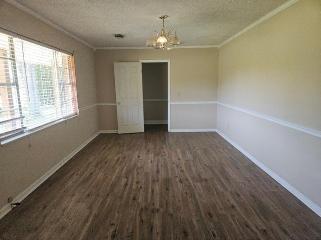 901 Grove St, Cottonwood, AL 36320 - unfurnished dining area with a chandelier, dark wood-style floors, a textured ceiling, and crown molding