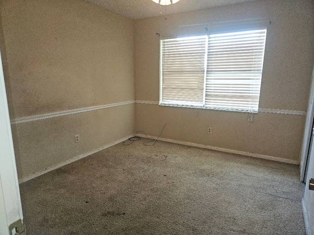 901 Grove St, Cottonwood, AL 36320 - carpeted empty room featuring baseboards