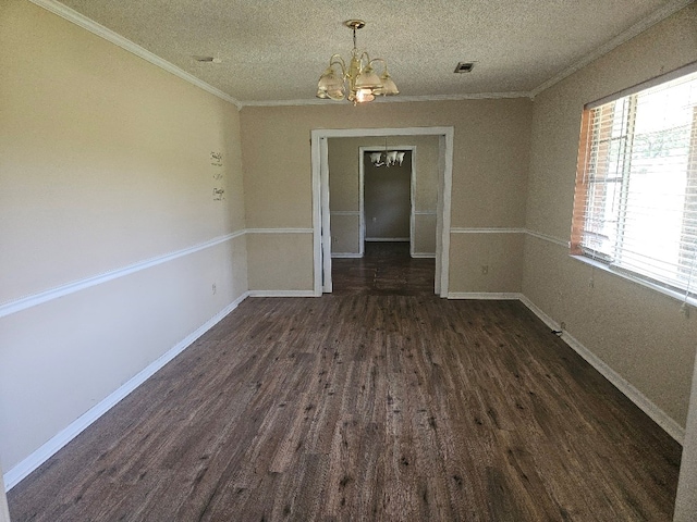901 Grove St, Cottonwood, AL 36320 - unfurnished dining area with a chandelier, ornamental molding, dark wood-style floors, and a textured ceiling