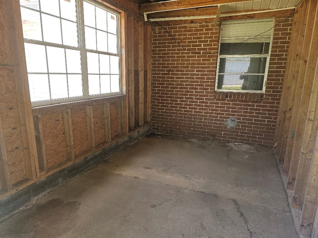 901 Grove St, Cottonwood, AL 36320 - unfurnished room featuring brick wall