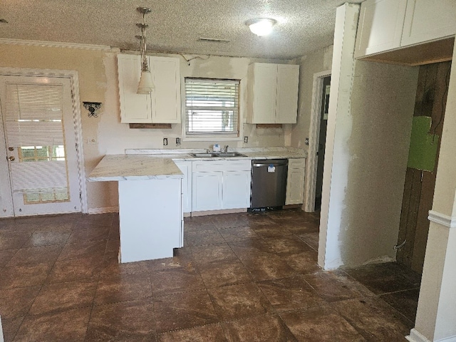 901 Grove St, Cottonwood, AL 36320 - kitchen with stainless steel dishwasher, white cabinets, and light countertops