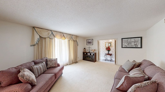 living room with light carpet and a textured ceiling