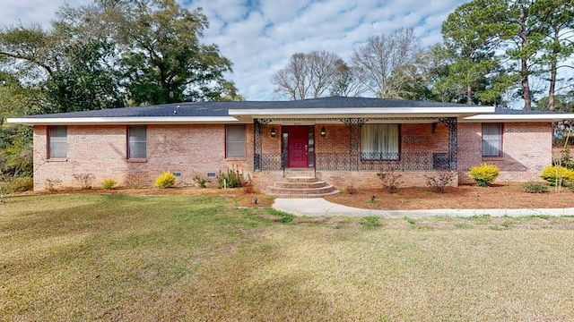 single story home featuring crawl space, covered porch, a front yard, and brick siding