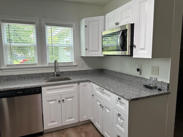 kitchen with white cabinets and stainless steel appliances