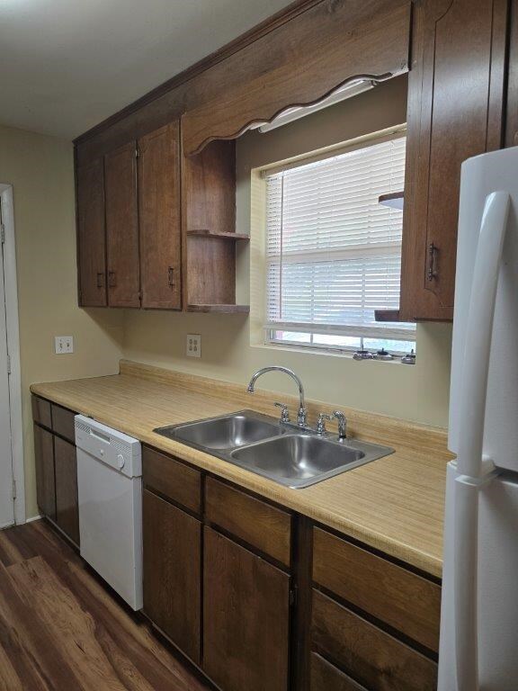 826 Old Newton Rd, Daleville, AL 36322 - kitchen featuring white appliances, a sink, dark wood-style floors, and light countertops