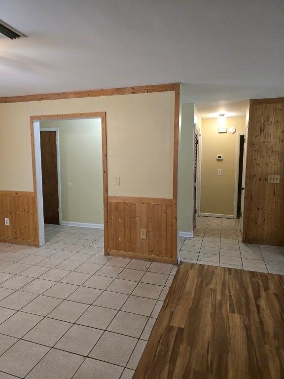 826 Old Newton Rd, Daleville, AL 36322 - spare room featuring wooden walls, wainscoting, and baseboards
