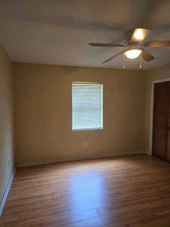 826 Old Newton Rd, Daleville, AL 36322 - empty room featuring wood finished floors, ceiling fan, and baseboards