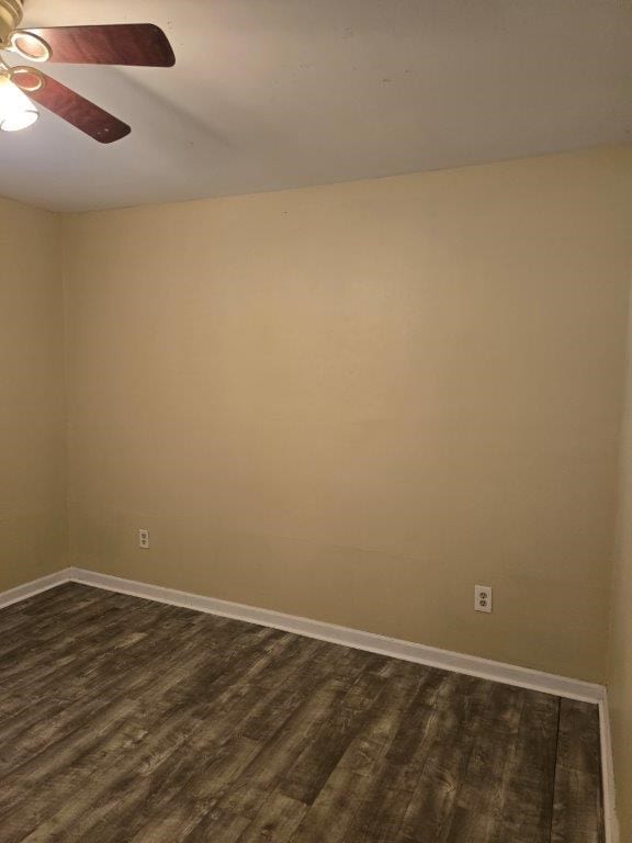 826 Old Newton Rd, Daleville, AL 36322 - spare room featuring dark wood finished floors, ceiling fan, and baseboards