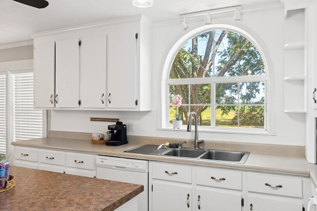 kitchen with dishwasher, white cabinetry, ornamental molding, and sink