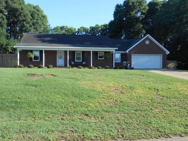 363 Vining Dr, Dothan, AL 36305 - single story home with an attached garage, concrete driveway, brick siding, and a porch