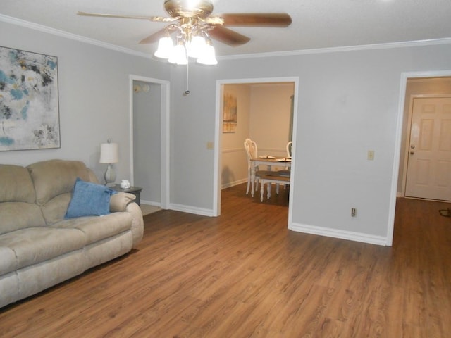 363 Vining Dr, Dothan, AL 36305 - living room featuring a ceiling fan, ornamental molding, wood finished floors, and baseboards