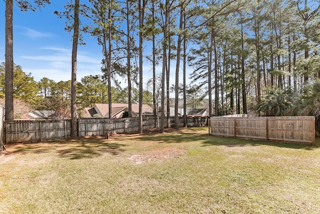 view of yard with fence