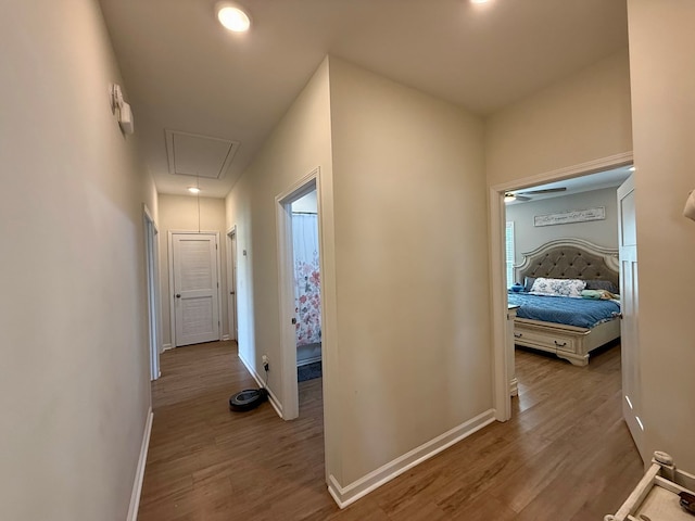 103 Neenan Dr, Enterprise, AL 36330 - corridor with attic access, wood finished floors, and baseboards