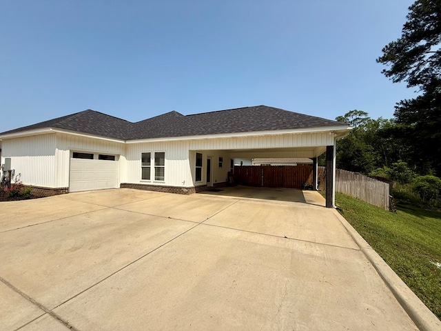 103 Neenan Dr, Enterprise, AL 36330 - view of front of house featuring driveway, a shingled roof, and an attached garage