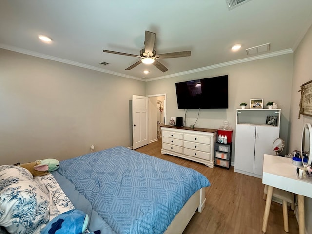 103 Neenan Dr, Enterprise, AL 36330 - bedroom with wood finished floors, ornamental molding, recessed lighting, and ceiling fan
