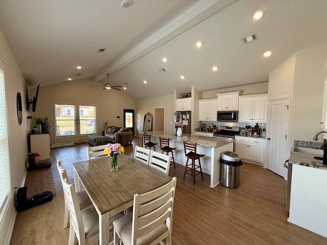 103 Neenan Dr, Enterprise, AL 36330 - dining area featuring light wood finished floors, beam ceiling, recessed lighting, high vaulted ceiling, and ceiling fan