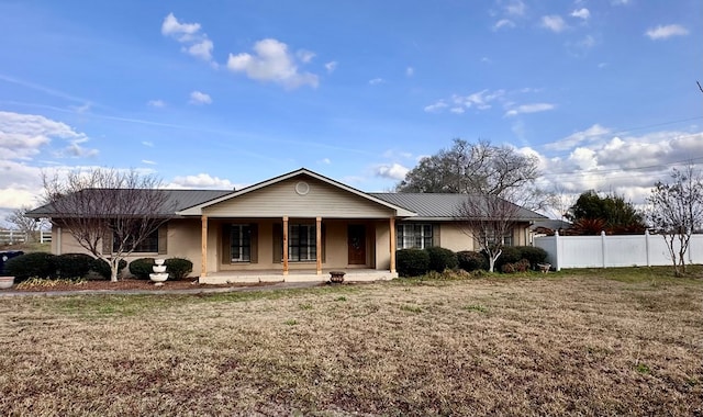 view of front of house with a porch and a front lawn