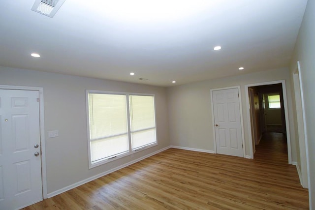 1125 Garden Ln, Dothan, AL 36301 - empty room featuring light wood-style flooring and recessed lighting