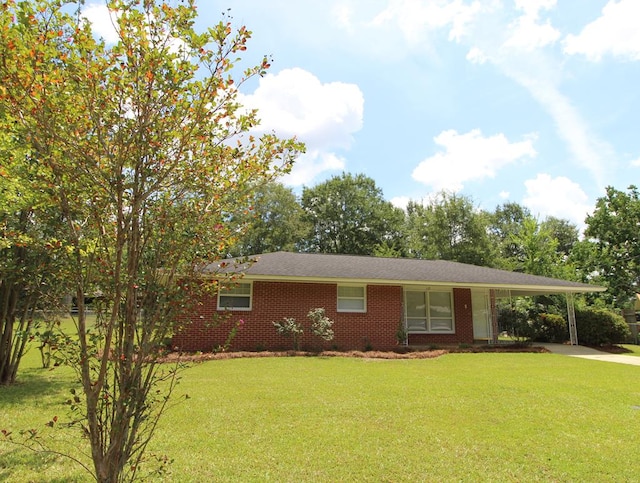 1125 Garden Ln, Dothan, AL 36301 - ranch-style home featuring a carport, driveway, a front lawn, and brick siding