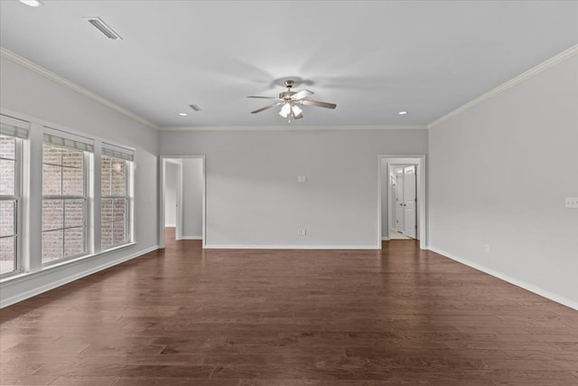 spare room featuring ceiling fan, ornamental molding, and dark wood-type flooring