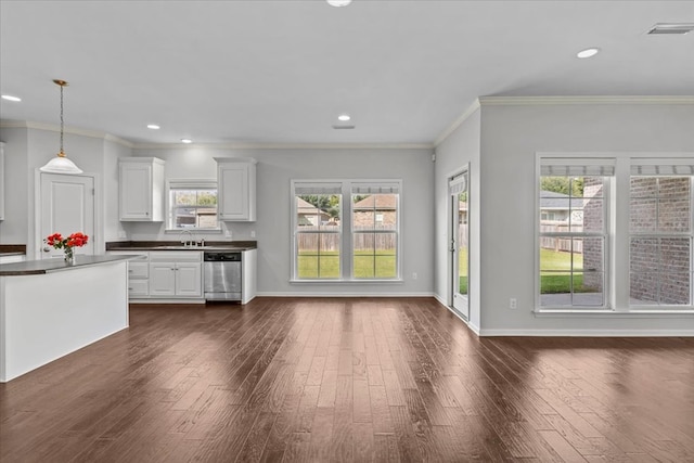 kitchen with white cabinets, dishwasher, dark hardwood / wood-style floors, and a wealth of natural light