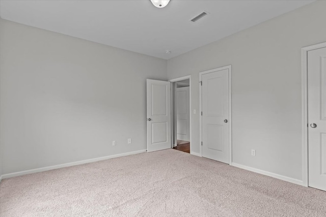 unfurnished bedroom with carpet