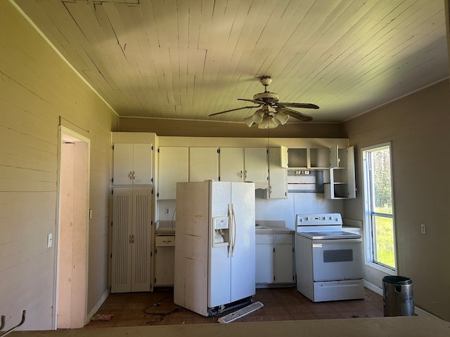 kitchen with white appliances, wooden ceiling, and white cabinetry
