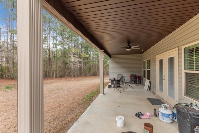 view of patio featuring ceiling fan