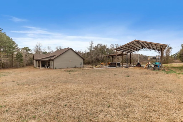 view of yard with a carport