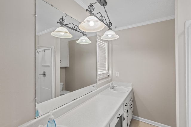 bathroom featuring a shower, tile patterned flooring, ornamental molding, vanity, and toilet