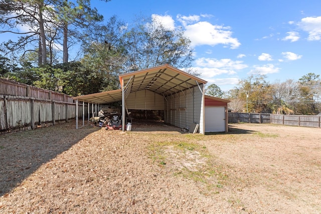 view of outbuilding with a carport