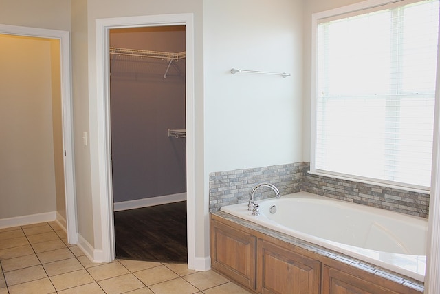105 Frisco Ln, Enterprise, AL 36330 - full bath with tile patterned floors, baseboards, a bath, and a spacious closet