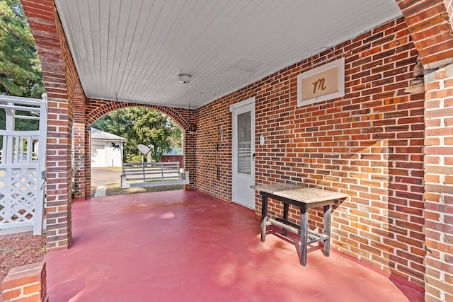 view of patio featuring a porch