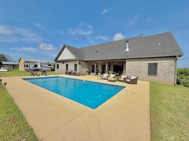1243 Silcox Rd, Ashford, AL 36312 - swimming pool with an outdoor living space, a patio, and a yard