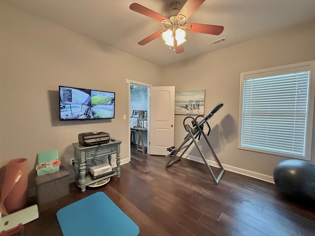 1243 Silcox Rd, Ashford, AL 36312 - exercise area with dark wood finished floors, baseboards, and ceiling fan