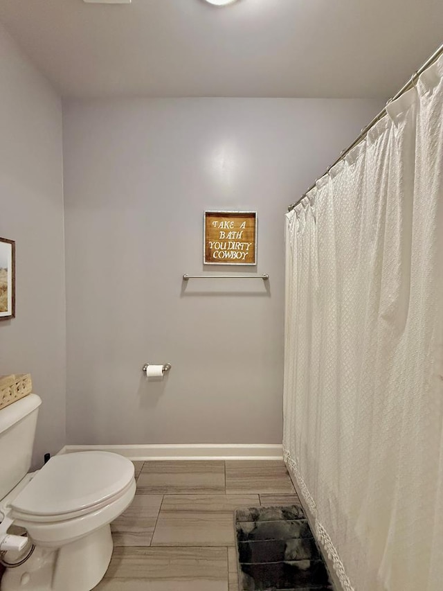 1243 Silcox Rd, Ashford, AL 36312 - bathroom featuring toilet and baseboards