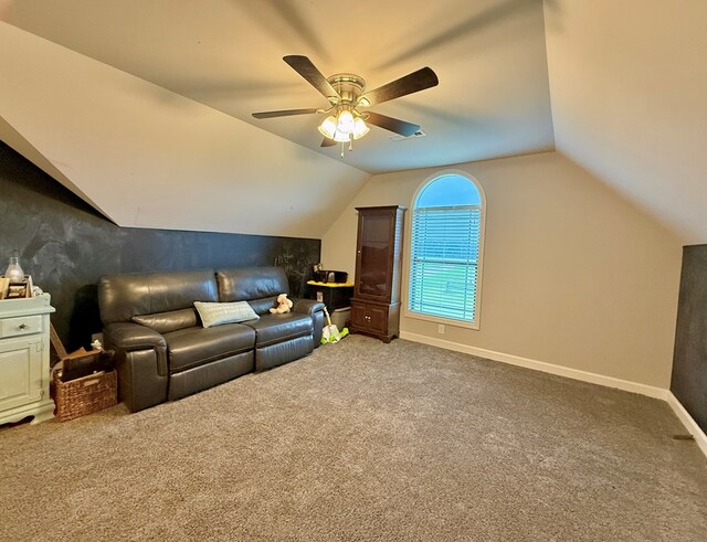 1243 Silcox Rd, Ashford, AL 36312 - carpeted living area featuring lofted ceiling, baseboards, and a ceiling fan