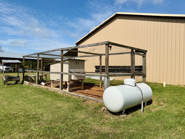 1243 Silcox Rd, Ashford, AL 36312 - view of grassy yard featuring exterior structure and an outbuilding
