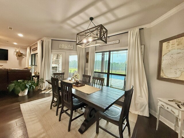1243 Silcox Rd, Ashford, AL 36312 - dining space with a chandelier and wood finished floors