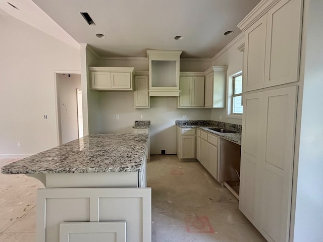 6161 Eddins Rd, Dothan, AL 36301 - kitchen featuring a center island, crown molding, and stone counters